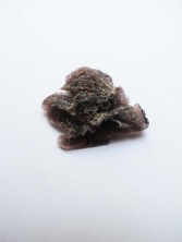 Аксинит, природный кристалл 
